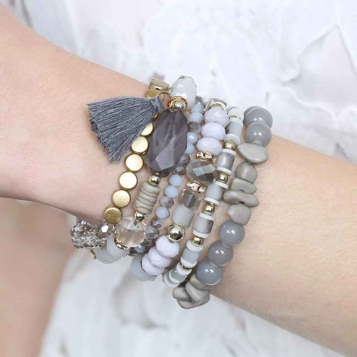 RIAH FASHION Coin Bead Multi Layer Versatile Statement Bracelets - Stackable Beaded Strand Stretch Bangles Sparkly Crystal, Tassel Charm