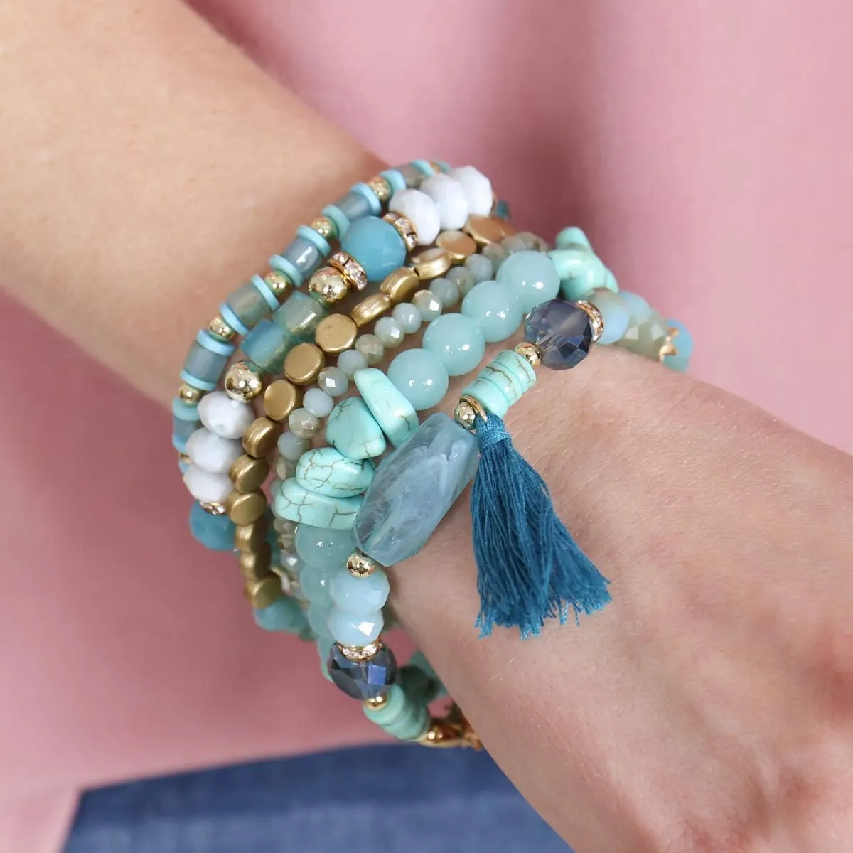 RIAH FASHION Coin Bead Multi Layer Versatile Statement Bracelets - Stackable Beaded Strand Stretch Bangles Sparkly Crystal, Tassel Charm